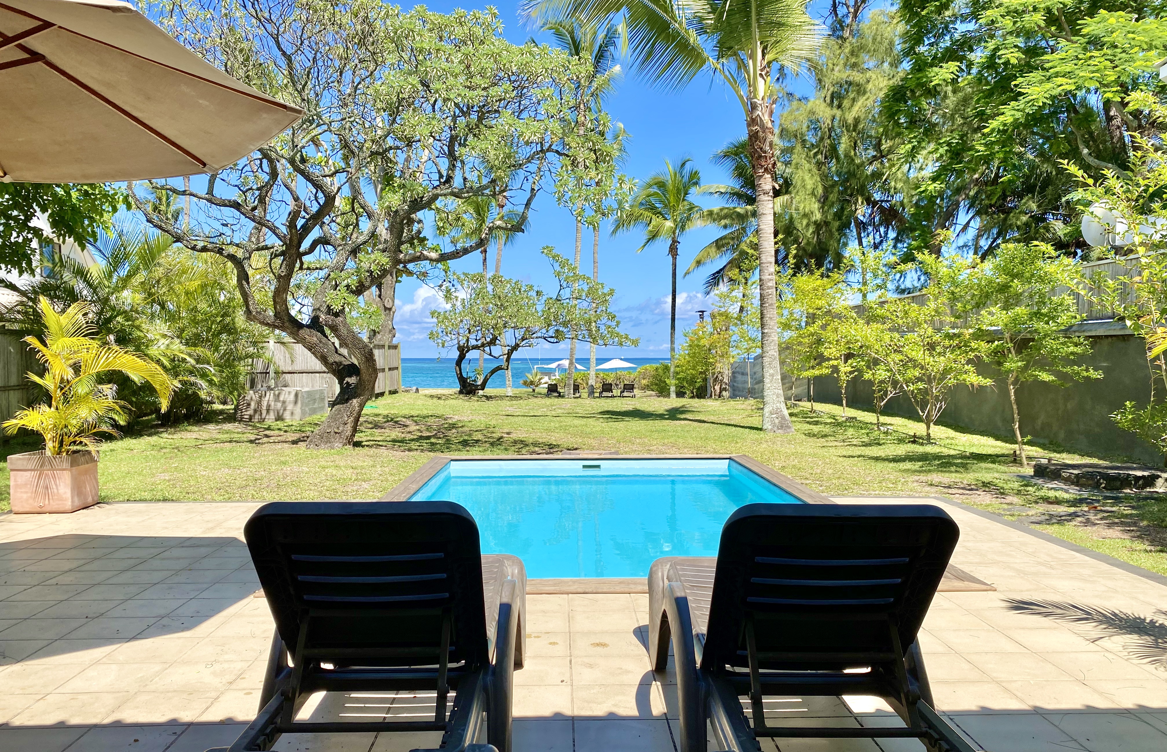 Villa Tropic 2  pool area with sun beds